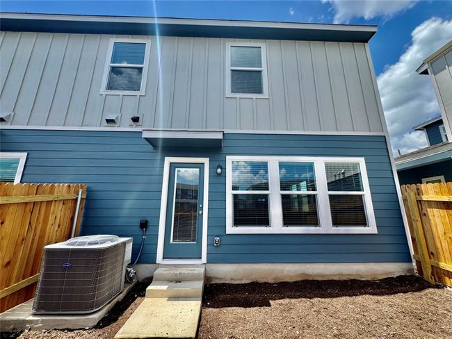 Back of property featuring board and batten siding | Image 5