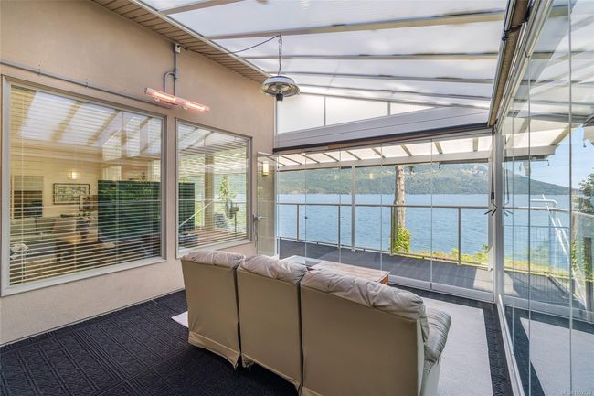 Sunroom / solarium with a water view | Image 87