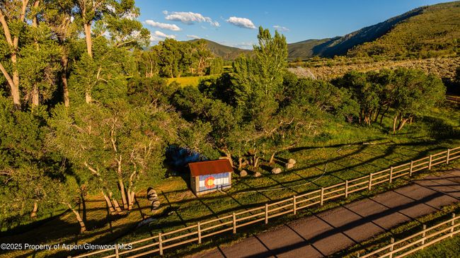 Pump house and small pond -- the property has ample water rights. | Image 28