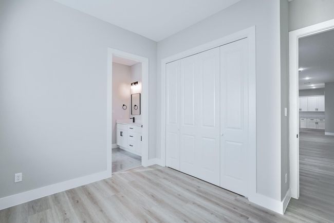 Another spacious secondary bedroom—ideal for family or guests | Image 32