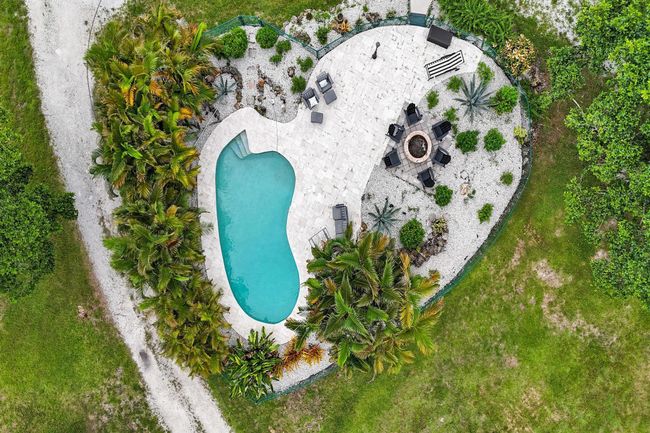502 Rambling Drive Cir, House other with 5 bedrooms, 3 bathrooms and null parking in Wellington FL | Image 103