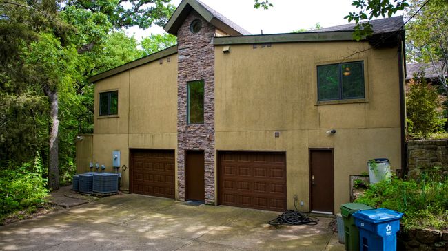 Side of property with garage entry. | Image 33