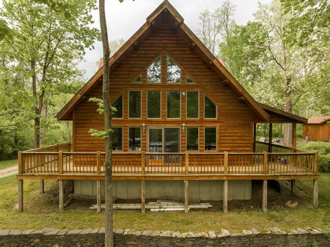 Rear view of house featuring a deck | Image 24