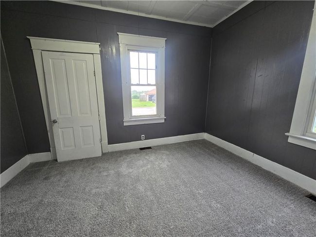 Empty room featuring carpet floors and baseboards | Image 17