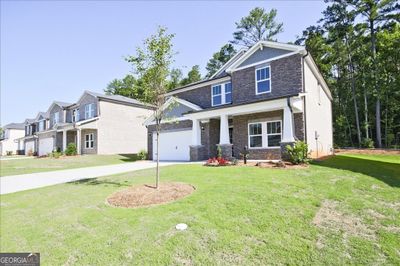 7757 Richmond Trail, House other with 5 bedrooms, 3 bathrooms and 2 parking in Fairburn GA | Image 2