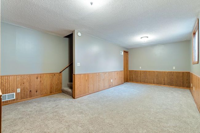 Lower level bed 6 OR great family room, hobby space, etc. | Image 47