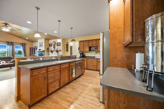 Views from kitchen to the great room & to the yard | Image 12