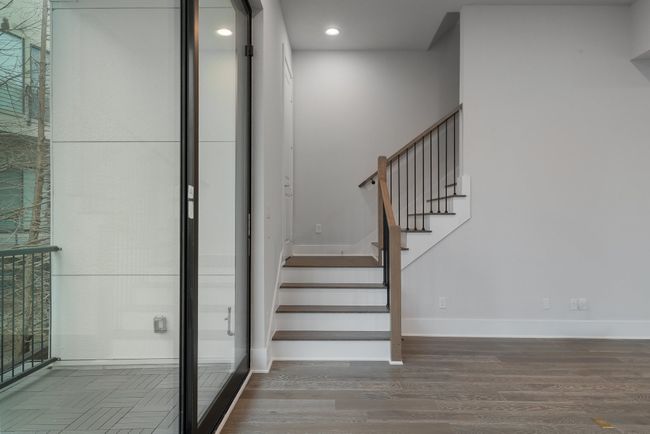 Stairs featuring recessed lighting, wood finished floors, and baseboards | Image 17