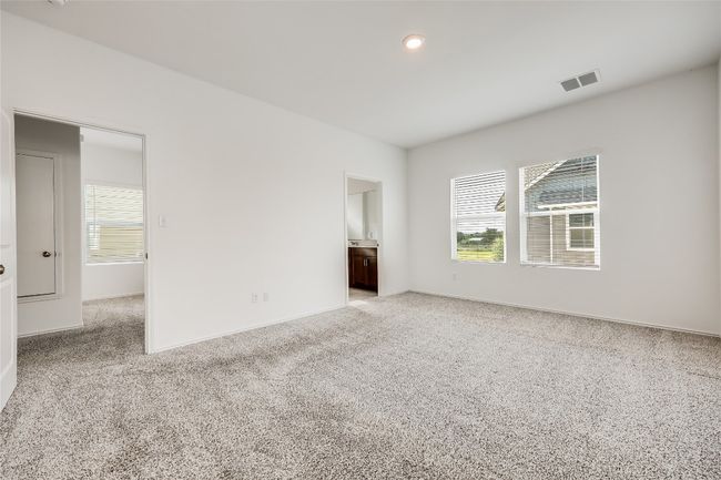 Carpeted empty room featuring baseboards and recessed lighting | Image 20