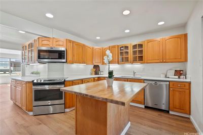 Reconfigured kitchen utilizes the space to make it feel more spacious | Image 1