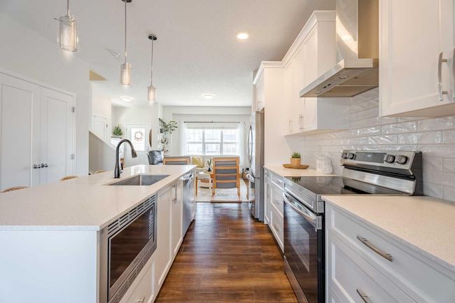 113 Palomino St, House other with 5 bedrooms, 4 bathrooms and 3 parking in Cochrane AB | Image 9