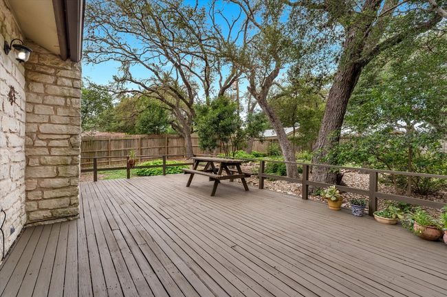 Oversized deck overlooking the natural landscaping and private backyard | Image 15