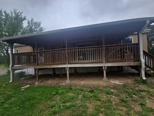 Back of house with a deck | Image 4