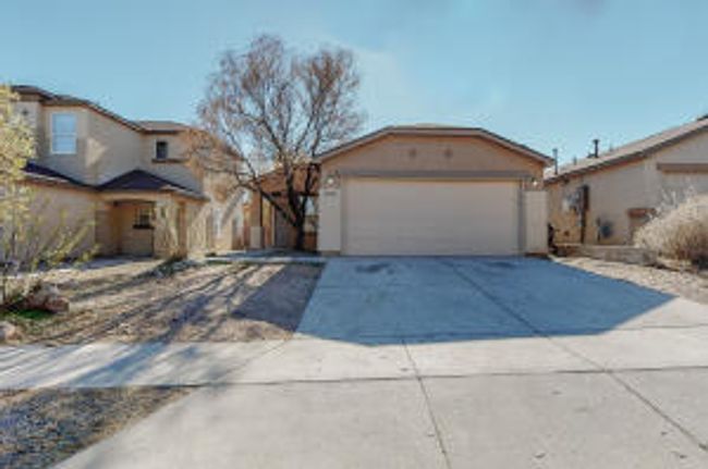 8828 Round Rock Road Sw, House other with 3 bedrooms, 2 bathrooms and null parking in Albuquerque NM | Image 2