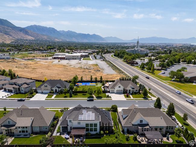 Aerial view of residential area with a mountainous background | Image 86