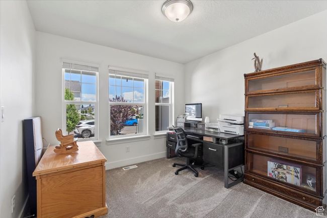 Carpeted home office featuring baseboards | Image 14