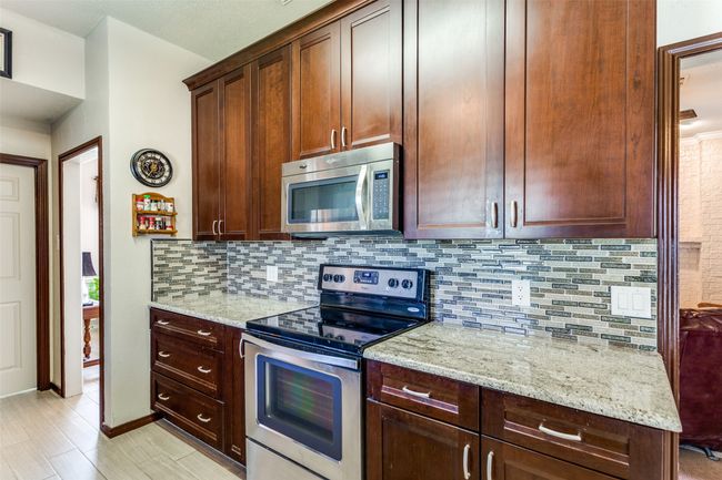 kitchen connected to dining room and living room | Image 14