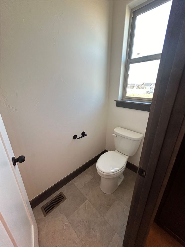 Bathroom featuring toilet | Image 6