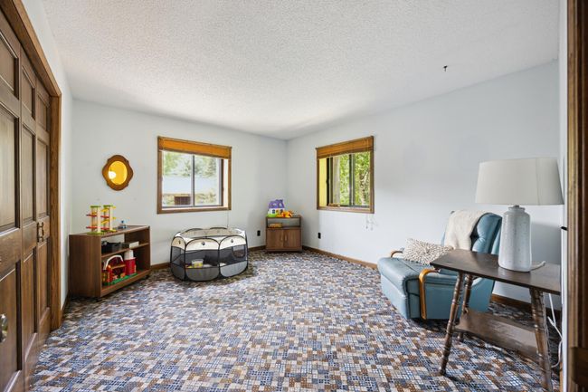 Fourth bedroom on the upper level. | Image 18