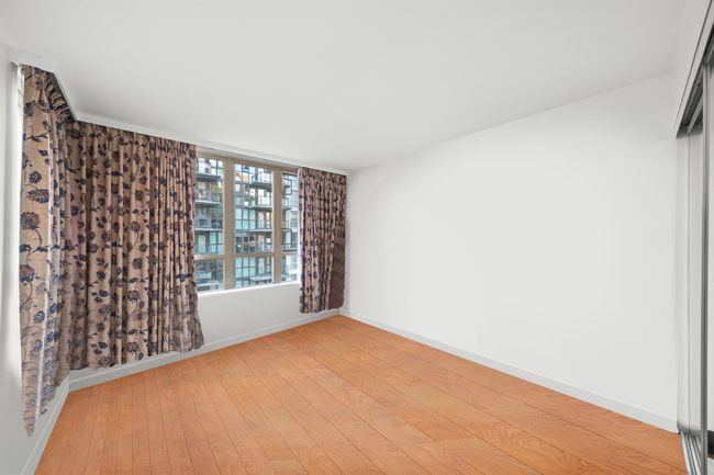 Unfurnished room with baseboards and light wood finished floors | Image 7