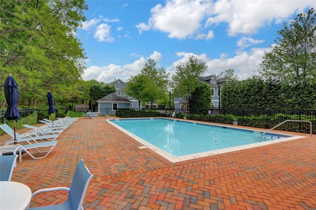 Community pool featuring a patio area | Image 28