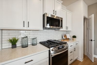 (Photo of decorated model) Imagine preparing a wonderful meal for dinner in this kitchen or entertaining friends and family over the weekend! | Image 3