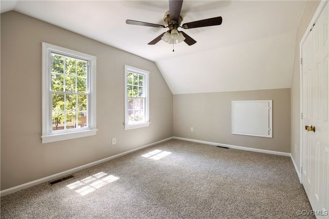2nd bedroom with carpet floors, vaulted ceiling, and ceiling fan | Image 16