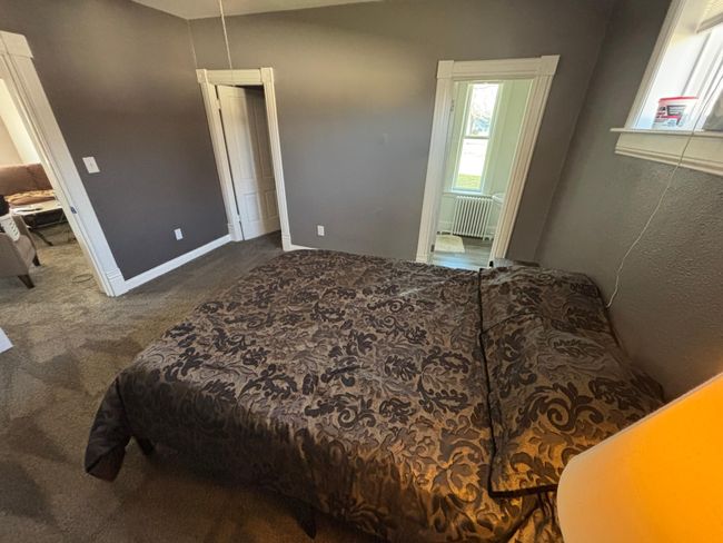Main Floor Master Bedroom with closet and bathroom shown | Image 12