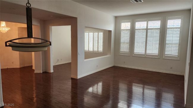 Open, separate living and dining area | Image 8