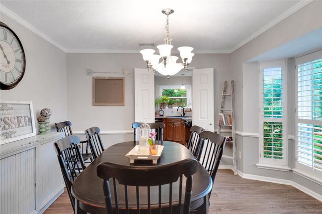 Dining room with entry to kitchen | Image 6