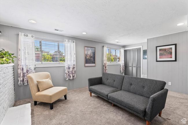 Carpeted living room featuring recessed lighting | Image 23
