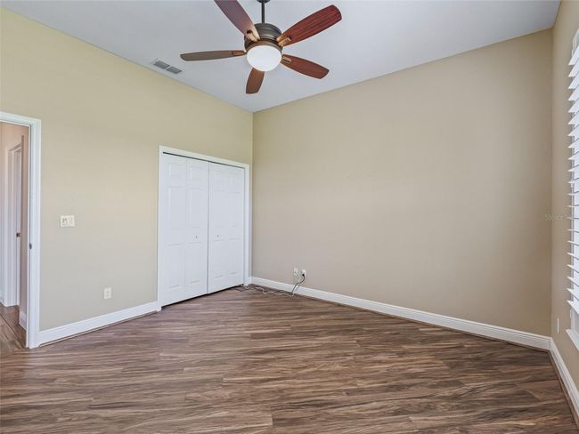Bedroom 3 w/Double closet & Laminate flooring | Image 49