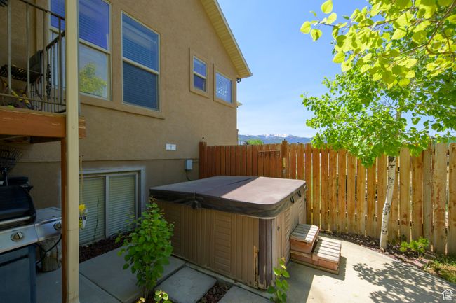Fully fenced private back yard with spa | Image 33