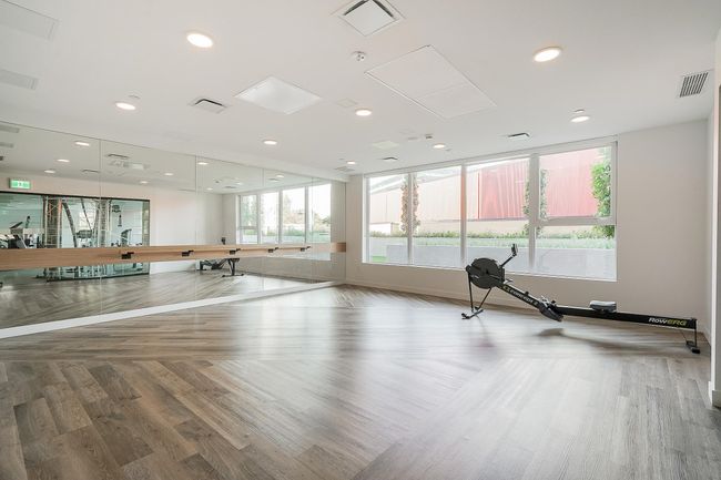 Workout area with visible vents, recessed lighting, baseboards, and wood finished floors | Image 33