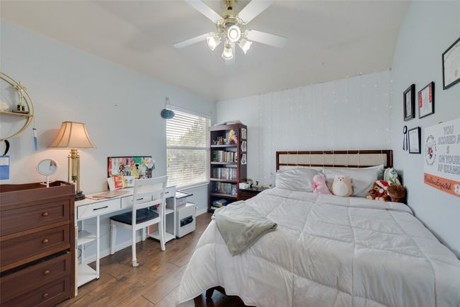 2nd upstairs bedroom with wood finished floors and a ceiling fan | Image 21