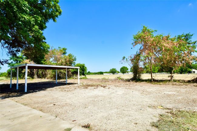 View of yard with a detached carport | Image 16