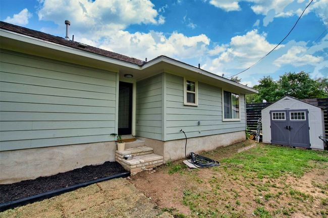Back of house with an outbuilding, a shed, and entry steps | Image 19