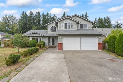 9901 141st Street E, House other with 4 bedrooms, 2 bathrooms and 2 parking in Puyallup WA | Image 1