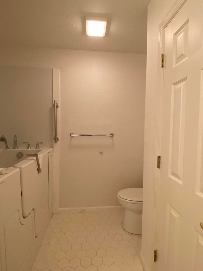 Nice linen closet in hall bath. | Image 32