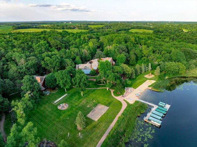 Spectacular manicured grounds and herringboned designed sidewalk paths over 30 acres of gorgeous real estate | Image 8