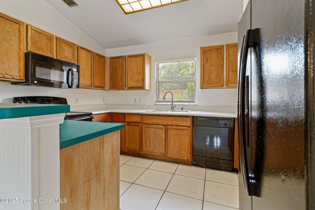 1706 Apache St Ne, House other with 3 bedrooms, 2 bathrooms and null parking in Palm Bay FL | Image 8