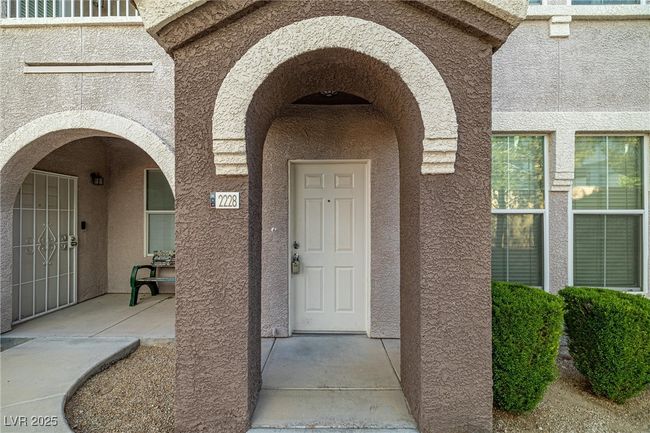 View of exterior entry with stucco siding | Image 6