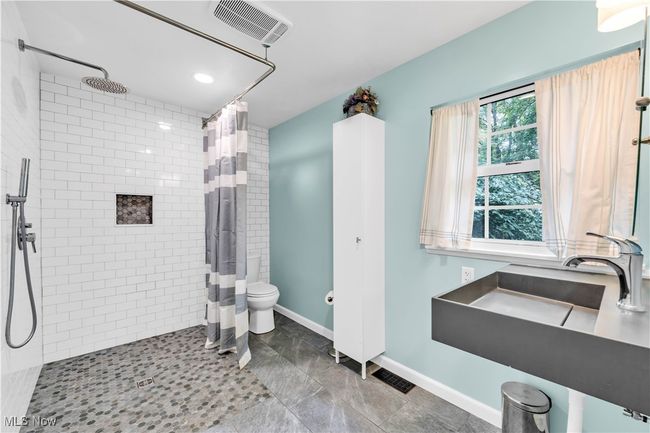 OVERSIZED FULL BATHROOM WITH SHOWER - NEWLY UPDATED WITH TILE FLOORING AND SHOWER TILE - FULL ACCESSIBILITY | Image 14