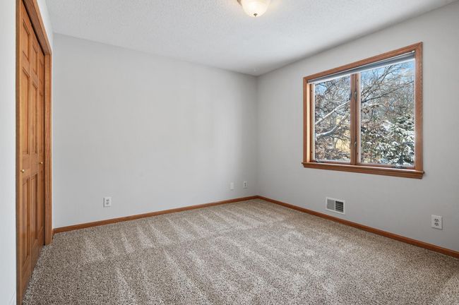 The fourth bedroom on the upper level. | Image 26