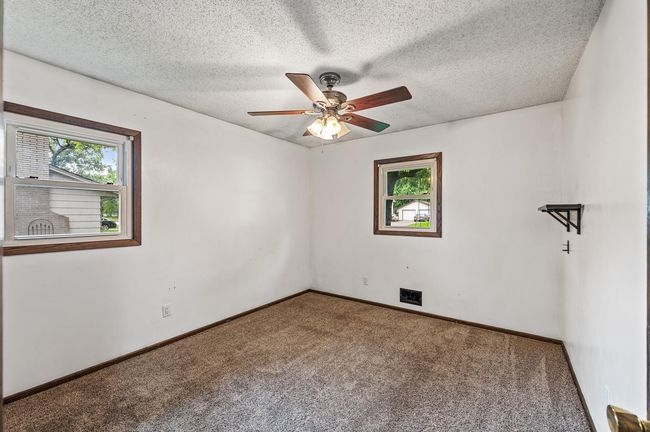 Main level primary bedroom. 11.5'x11'. | Image 9