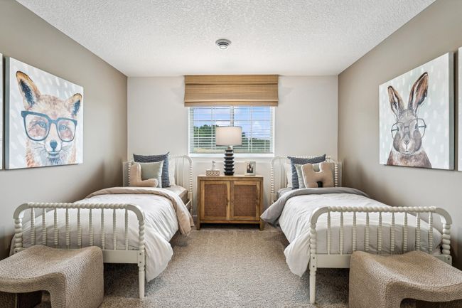 Photo is of the actual model. The lower level bedroom is another great place for guests. | Image 17