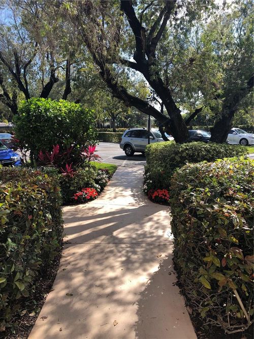 327-10001 W Atlantic Blvd, Coral Springs, FL, 33071-6560 | Card Image