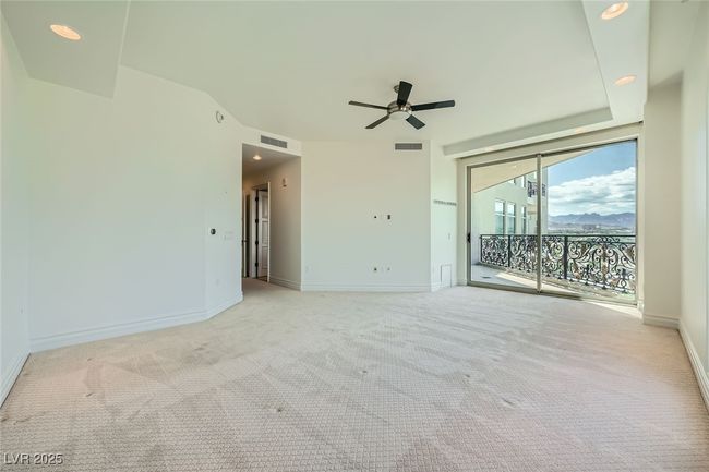 Unfurnished room with a ceiling fan, light colored carpet, baseboards, and recessed lighting | Image 18