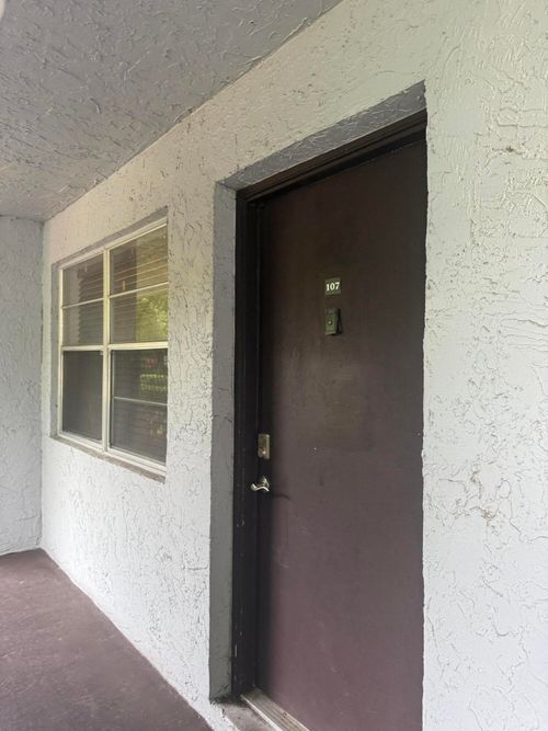 107-8450 Lagos De Campo Blvd, TAMARAC, FL, 33321-3754 | Card Image