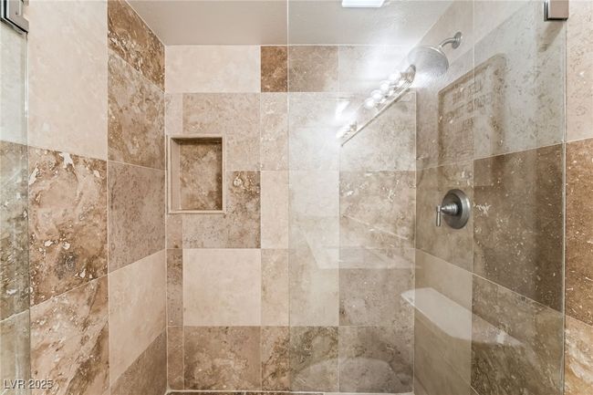 Bathroom featuring tiled shower | Image 22